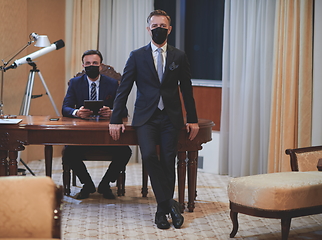 Image showing business team wearing crona virus protection face mask