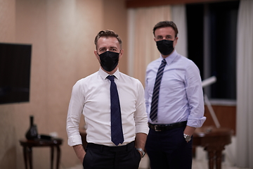 Image showing business team wearing crona virus protection face mask