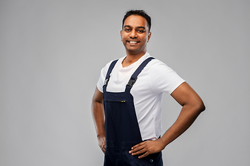 Image showing happy smiling indian worker or builder