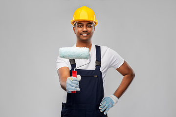 Image showing happy indian painter or builder with paint roller