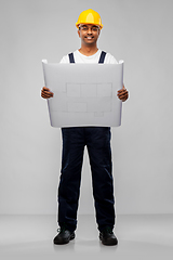 Image showing happy indian builder in helmet with blueprint