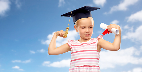 Image showing little girl in mortarboard with diploma