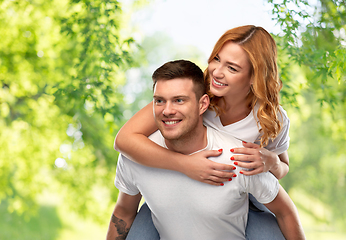 Image showing happy couple in white t-shirts having fun