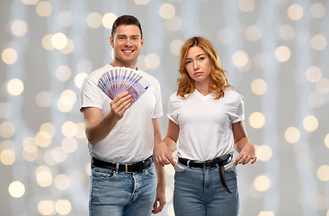 Image showing couple with euro money and empty pockets