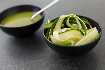 Image showing peeled or sliced zucchini and cream soup in bowl