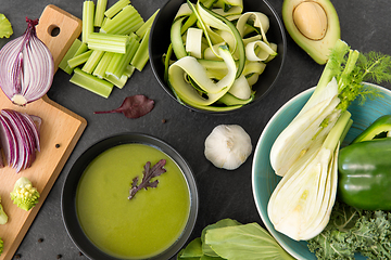 Image showing green vegetables and cream soup in ceramic bowl