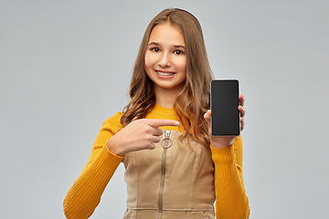 Image showing smiling teenage girl showing smartphone