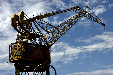 Image showing street lamp clouds and crane in argentina