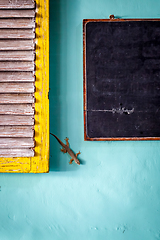 Image showing Gecko and blackboard on a wall, Ubud, Bali, Indonesia