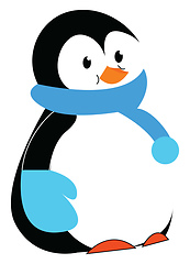 Image showing A cute penguin in winter clothes wearing blue scarf and hand glo