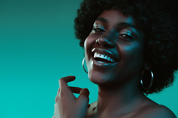 Image showing Portrait of female high fashion model in neon light