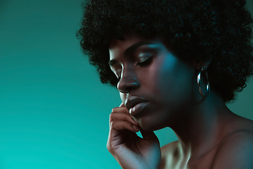 Image showing Portrait of female high fashion model in neon light