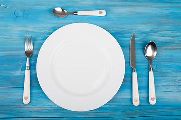 Image showing empty plate with knife and fork