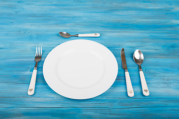 Image showing empty plate with knife and fork