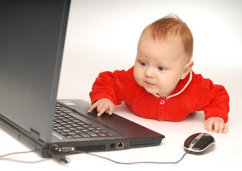 Image showing Baby and notebook