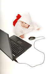 Image showing Baby and notebook