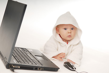 Image showing Baby and notebook