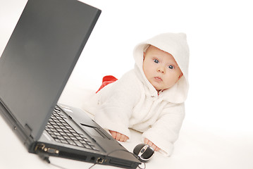 Image showing Baby and notebook