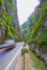 Image showing Speeding car on canyon road