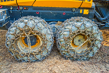 Image showing Skidder wheels in forest