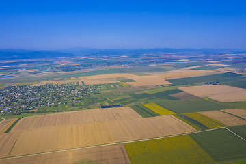 Image showing Aerial view of summer fields and village