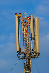 Image showing Telecommunication tower against blue sky