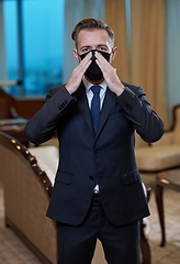 Image showing business man wearing protective face mask at office