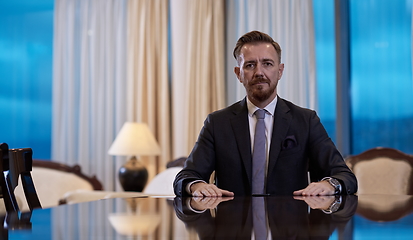 Image showing Portrait of smiling ceo at modern office in stylish suit