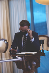 Image showing business man wearing protective face mask at office