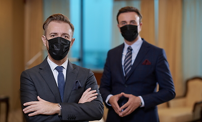 Image showing business team wearing crona virus protection face mask