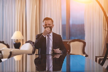 Image showing business man wearing protective face mask at office