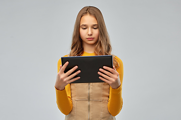 Image showing teenage girl using tablet computer