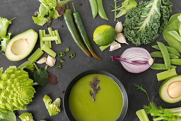 Image showing green vegetables and cream soup in ceramic bowl