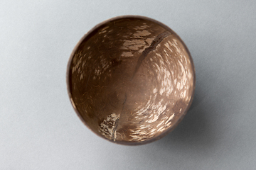 Image showing close up of coconut bowl on table