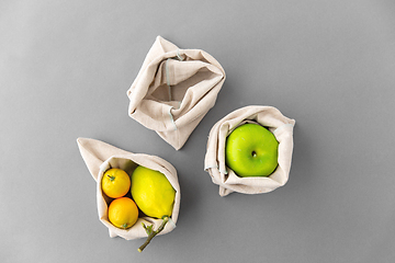 Image showing fruits in reusable canvas bags for food shopping