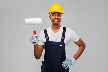 Image showing happy indian painter or builder with paint roller