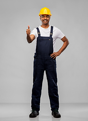 Image showing happy indian worker or builder showing thumbs up