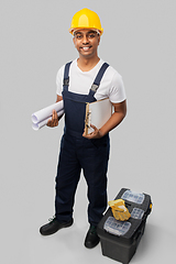 Image showing happy indian builder with blueprint and clipboard