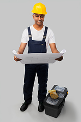 Image showing happy indian builder with blueprint and tool box
