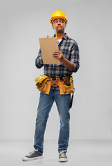 Image showing thinking builder with clipboard and pencil