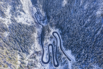 Image showing Winter mountain road from above