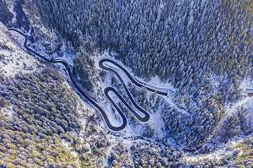 Image showing Winter curvy road in Romania