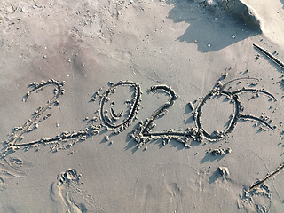 Image showing Happy year 2020 on wet sand