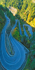 Image showing Serpentine road in green forest