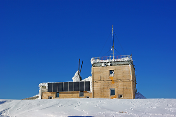 Image showing Wooden chalet on mountain summit