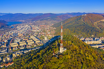 Image showing Antenna tower on autumn hill