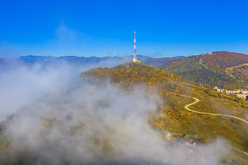 Image showing Fog comming over antenna tower
