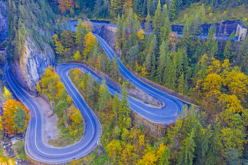 Image showing Uphill winding road in autumn mountain