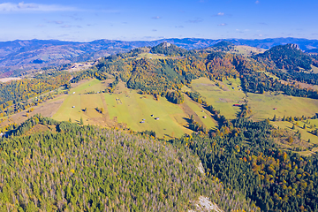 Image showing Aerial meadows and forest in autumn mountain