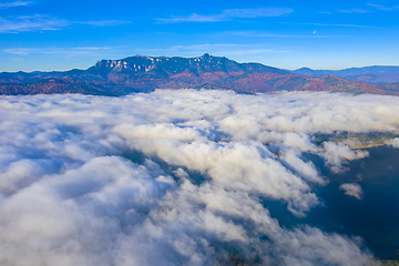 Image showing Flying over mist clouds